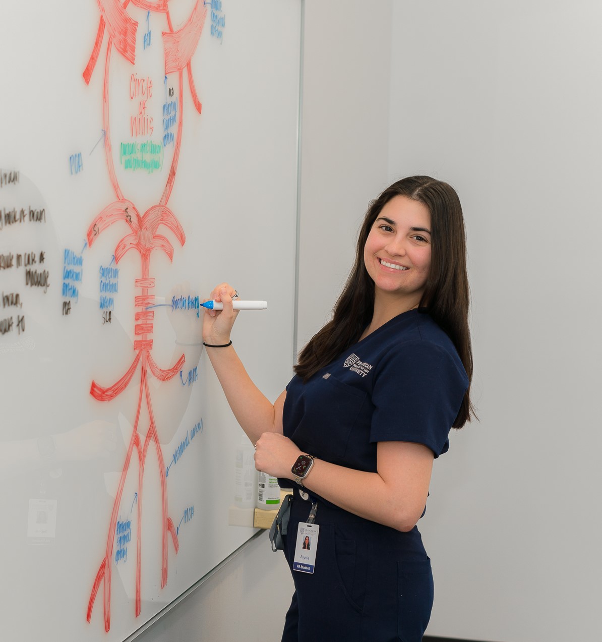 student using whiteboard