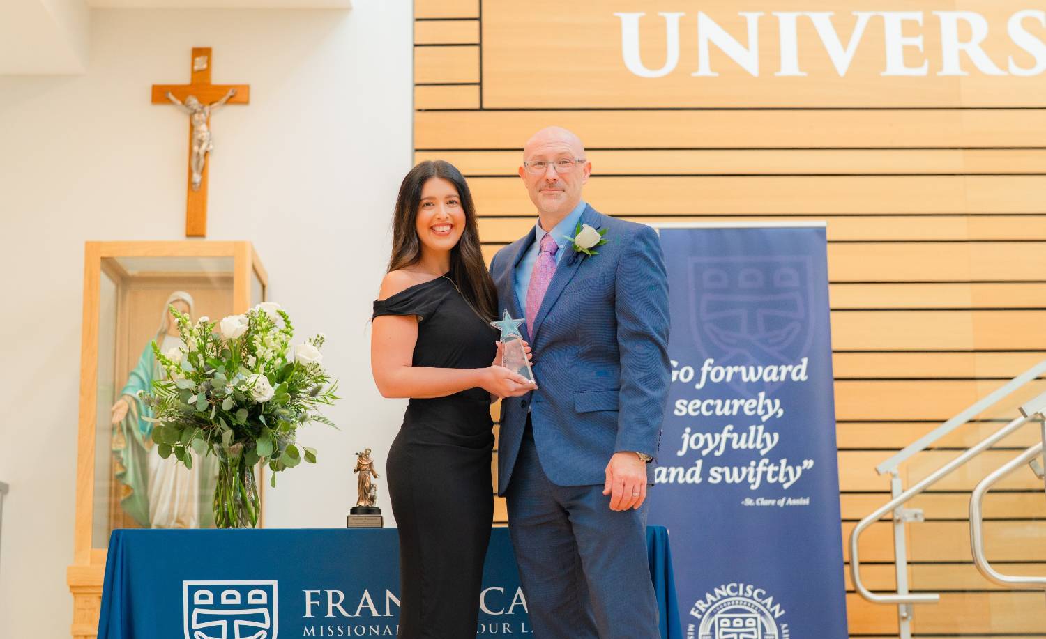 Kayla Jacobs recieving award